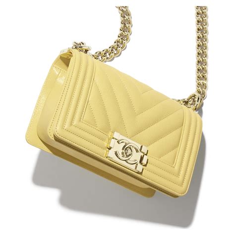 small boy chanel handbag gold